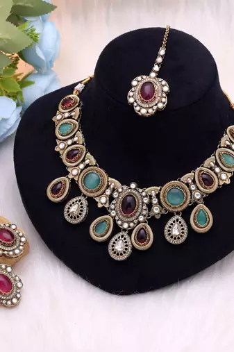Maroon & light green color kundan jewellery set