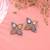 White color dual tone oxidised earrings traditional finish