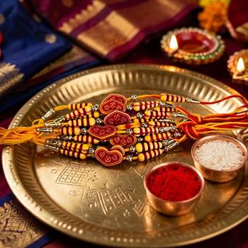 12 pieces combo multi color thread & bead designer rakhis 1