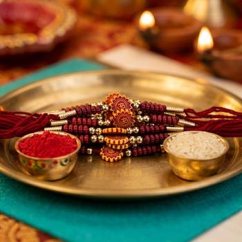 12 pieces combo multi color om religious thread rakhis 1