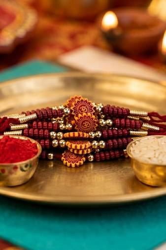 12 pieces combo multi color om religious thread rakhis