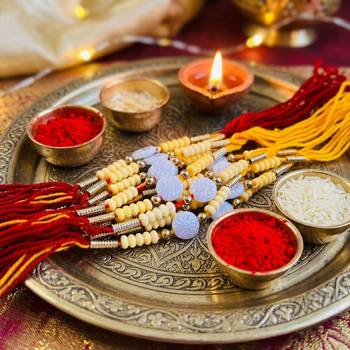 12 pieces combo multi color ethnic designer thread rakhis 1