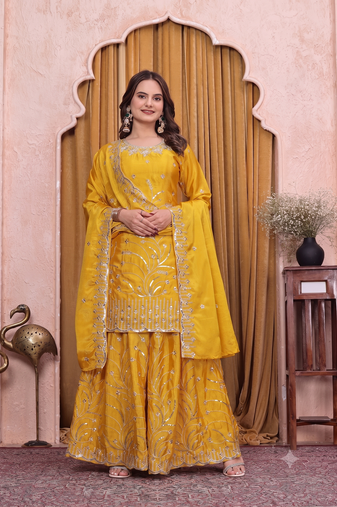 Yellow embroidered sharara suit set for women with scalloped dupatta