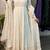 White georgette embroidered flared gown set