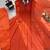 Orange faux georgette embroidered flared gown set