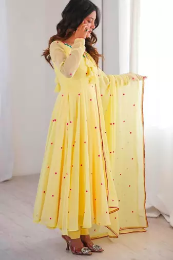 Yellow faux georgette embroidered flared gown set