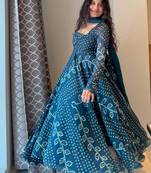 Teal-blue faux georgette embroidered flared gown set