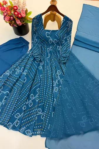 Teal-blue faux georgette embroidered flared gown set