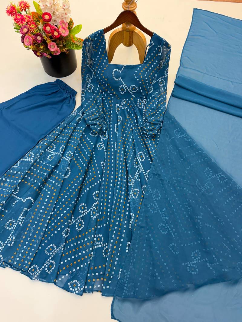 Teal-blue faux georgette embroidered flared gown set