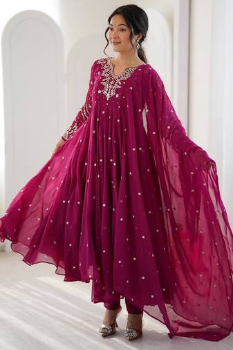 Rani-pink faux georgette embroidered flared gown set