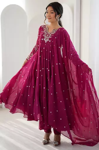 Rani-pink faux georgette embroidered flared gown set