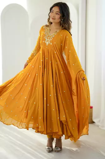 Dark-yellow faux georgette embroidered flared gown set