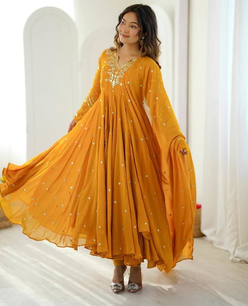 Dark-yellow faux georgette embroidered flared gown set