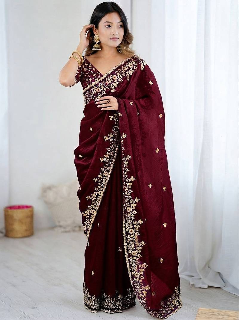 Maroon jimmy choo zari butti work embellished wedding wear saree