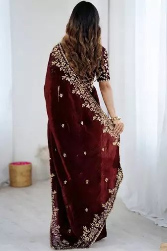 Maroon jimmy choo zari butti work embellished wedding wear saree