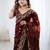 Maroon jimmy choo zari butti work embellished wedding wear saree