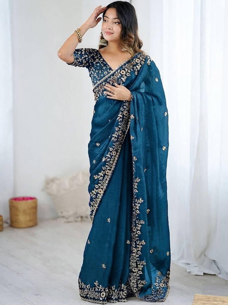 Blue jimmy choo zari butti work embellished wedding wear saree
