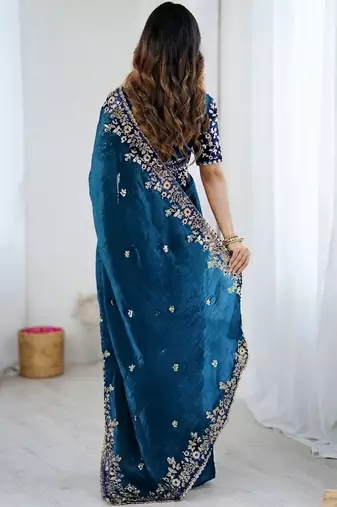 Blue jimmy choo zari butti work embellished wedding wear saree