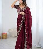 Wine jimmy choo zari butti work embellished wedding wear saree