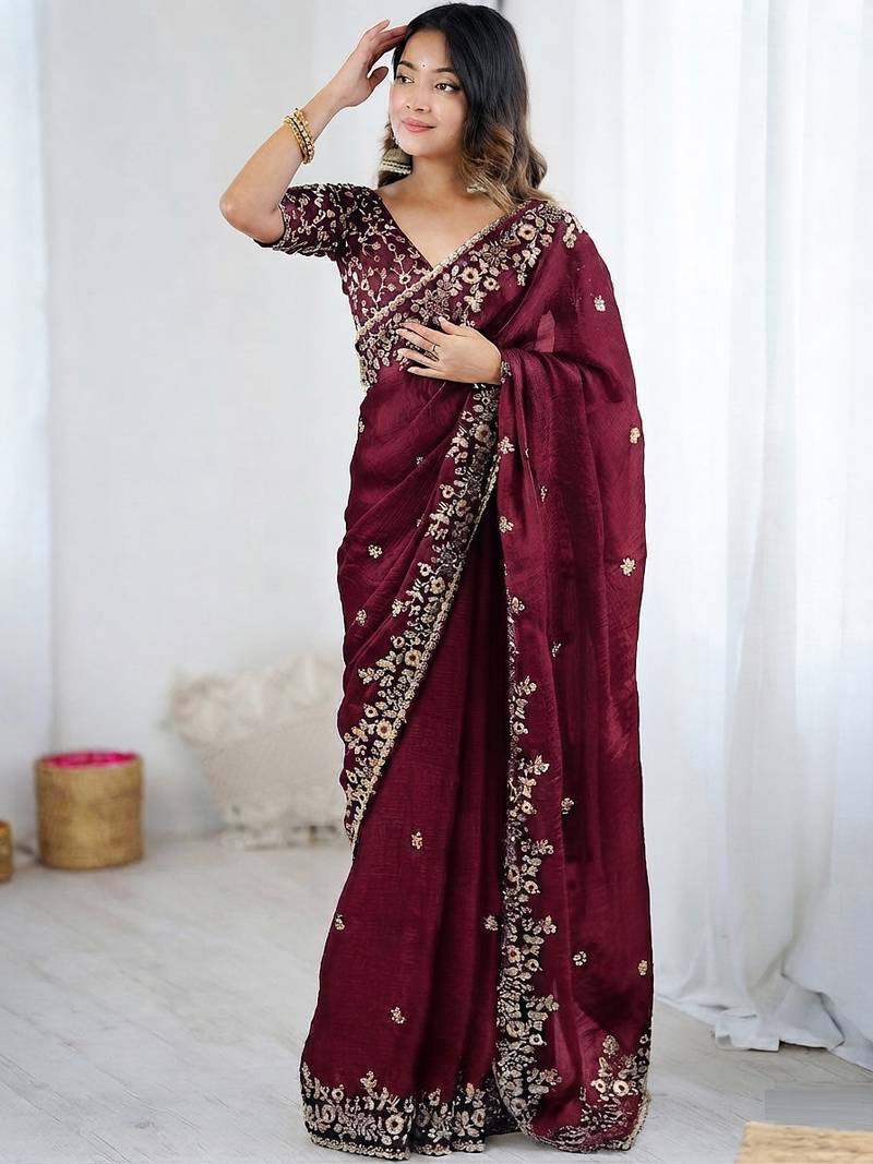 Wine jimmy choo zari butti work embellished wedding wear saree