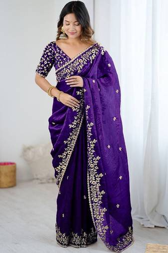 Purple jimmy choo zari butti work embellished wedding wear saree