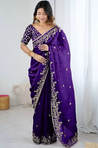 Purple jimmy choo zari butti work embellished wedding wear saree