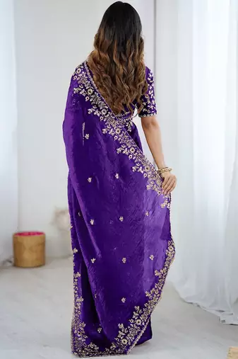 Purple jimmy choo zari butti work embellished wedding wear saree