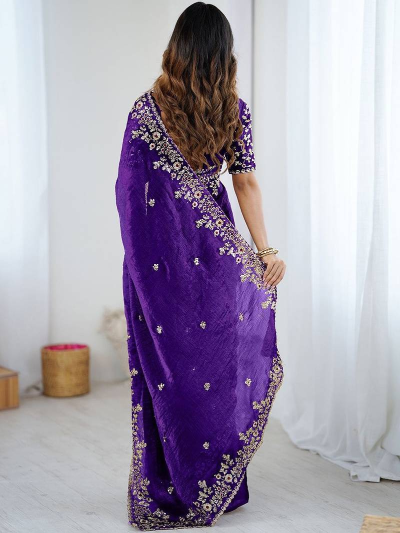 Purple jimmy choo zari butti work embellished wedding wear saree