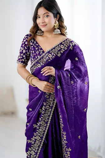 Purple jimmy choo zari butti work embellished wedding wear saree
