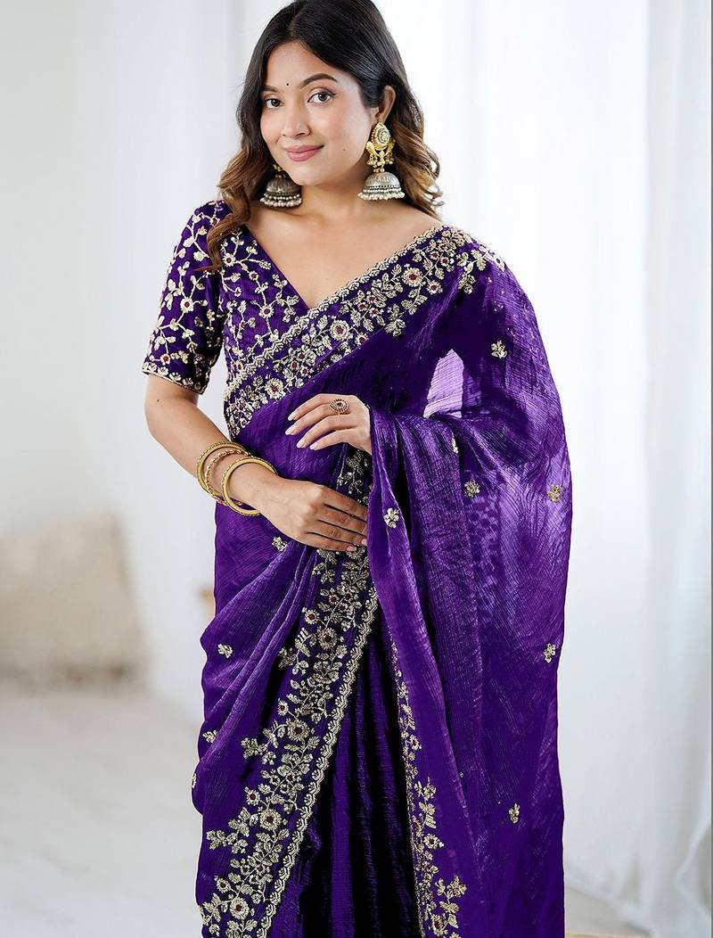 Purple jimmy choo zari butti work embellished wedding wear saree