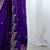 Purple jimmy choo zari butti work embellished wedding wear saree