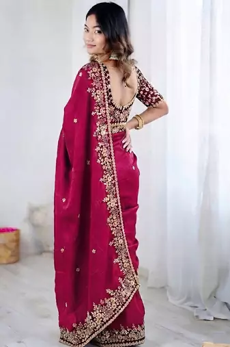 Pink jimmy choo zari butti work embellished wedding wear saree