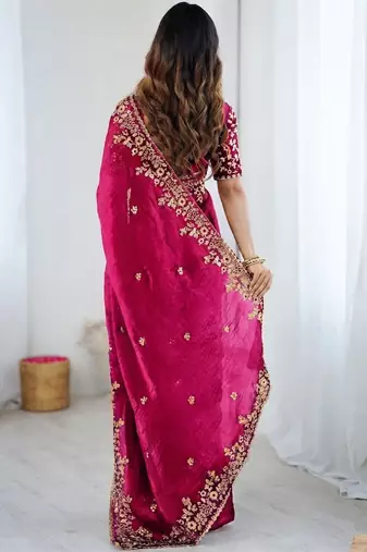 Pink jimmy choo zari butti work embellished wedding wear saree
