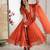 Orange faux georgette embroidered flared gown set