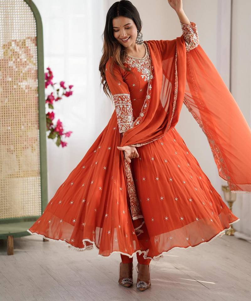 Orange faux georgette embroidered flared gown set