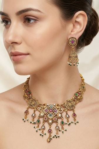 Antique gold plated peacock motif multicolor stone studded temple choker necklace set with matching jhumka