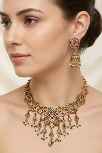 Antique gold plated peacock motif multicolor stone studded temple choker necklace set with matching jhumka