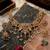 Antique gold plated peacock motif multicolor stone studded temple choker necklace set with matching jhumka