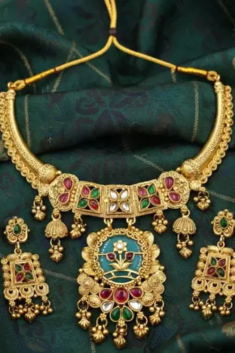 Gold plated temple jewellery choker necklace set with green & ruby red stones & matching earrings for women