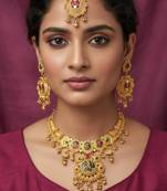 Gold plated pink & green meenakari ethnic hasli necklace set with earrings and maang tikka for women