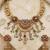 Antique gold plated multi-stone temple necklace set with matching jhumka earrings for women