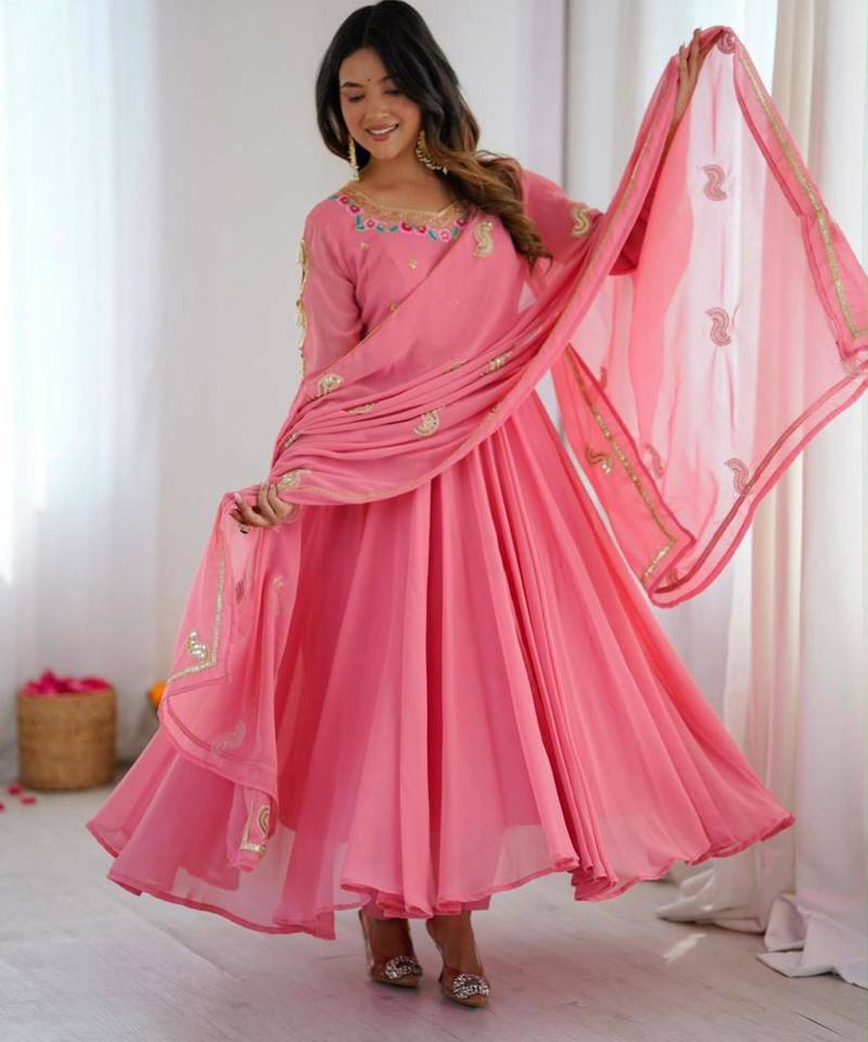 Pink faux georgette embroidered flared gown set