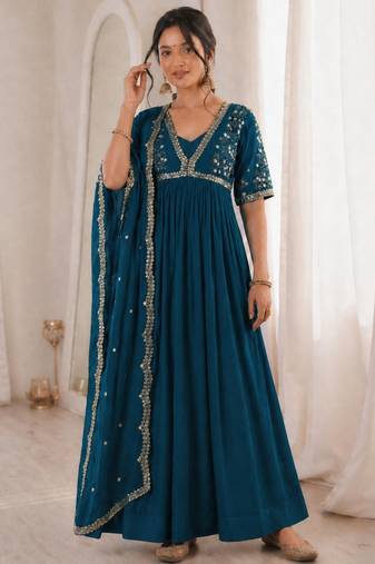 Teal-blue faux georgette embroidered flared gown set