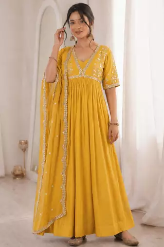 Yellow faux georgette embroidered flared gown set