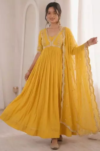 Yellow faux georgette embroidered flared gown set