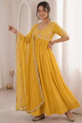 Yellow faux georgette embroidered flared gown set