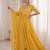 Yellow faux georgette embroidered flared gown set