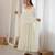 Off-white chanderi embroidered flared gown set
