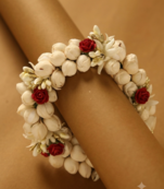 Traditional Mogra Gajra hair accessory with Red Roses & Gold Accents