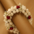 Traditional Mogra Gajra hair accessory with Red Roses & Gold Accents
